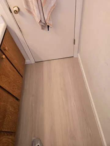 Bathroom Flooring & Baseboard Replacement and toilet replacement — completed