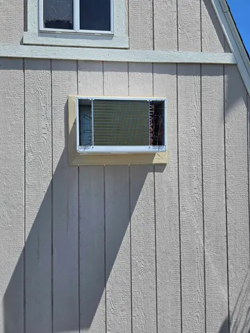 Window AC Replacement and new exterior trim — completed
