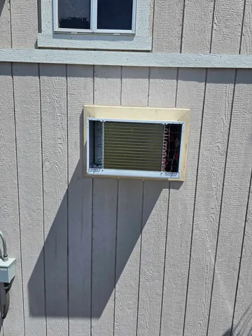 Window AC Replacement and new exterior trim — completed