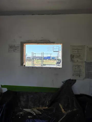 Window AC Replacement and new exterior trim — before
