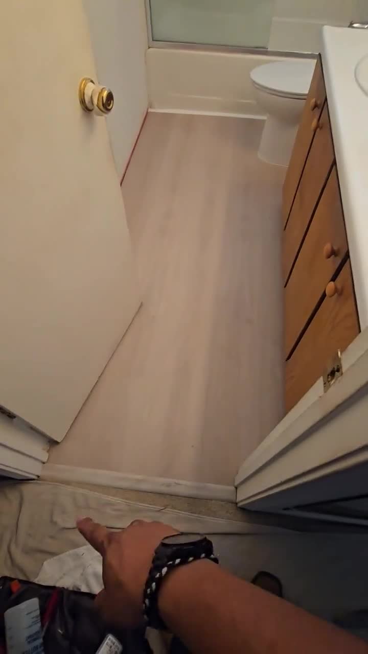 Finished bathroom floor shown in the supplied project walkthrough